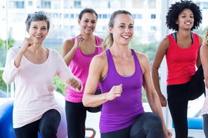 Group of women doing cardio exercise